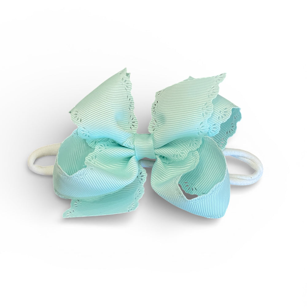 Crystalline Eyelet Embossed Bow on Nylon Band by Wee Ones