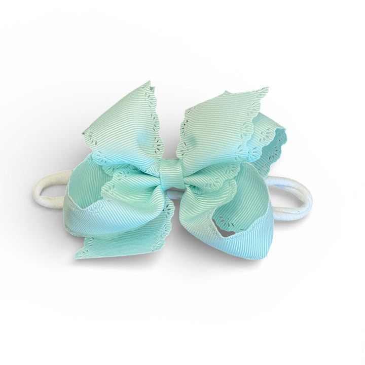 Crystalline Eyelet Embossed Bow on Nylon Band by Wee Ones
