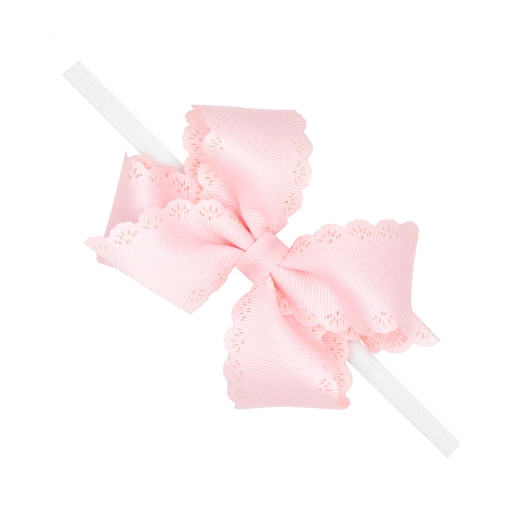 Powder Pink Eyelet Embossed Bow on Nylon Band by Wee Ones