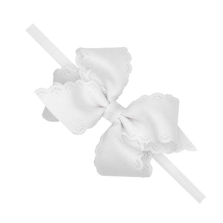 White Eyelet Embossed Bow on Nylon Band by Wee Ones